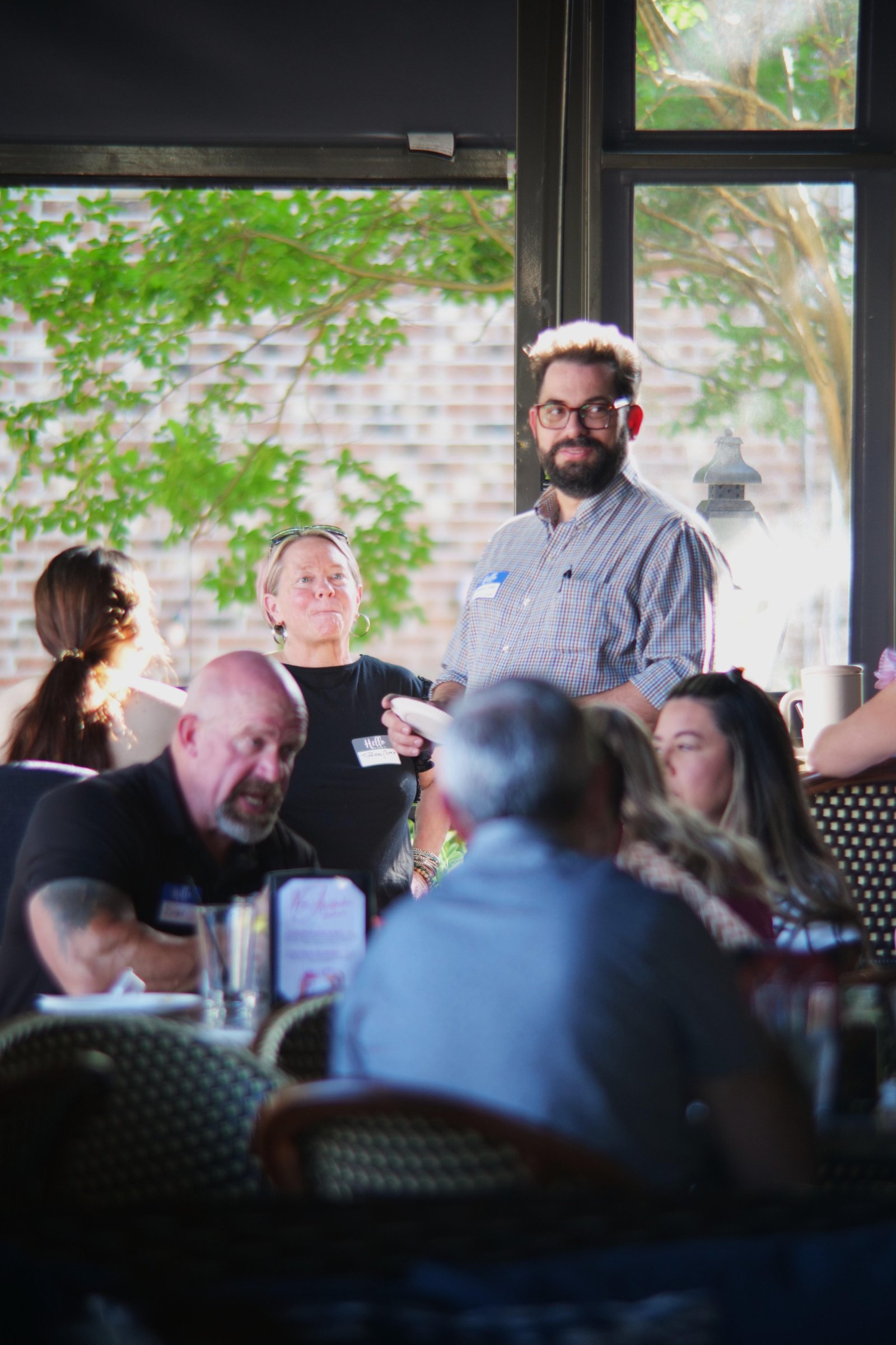 Charlotte business networking event hosted in a full room
