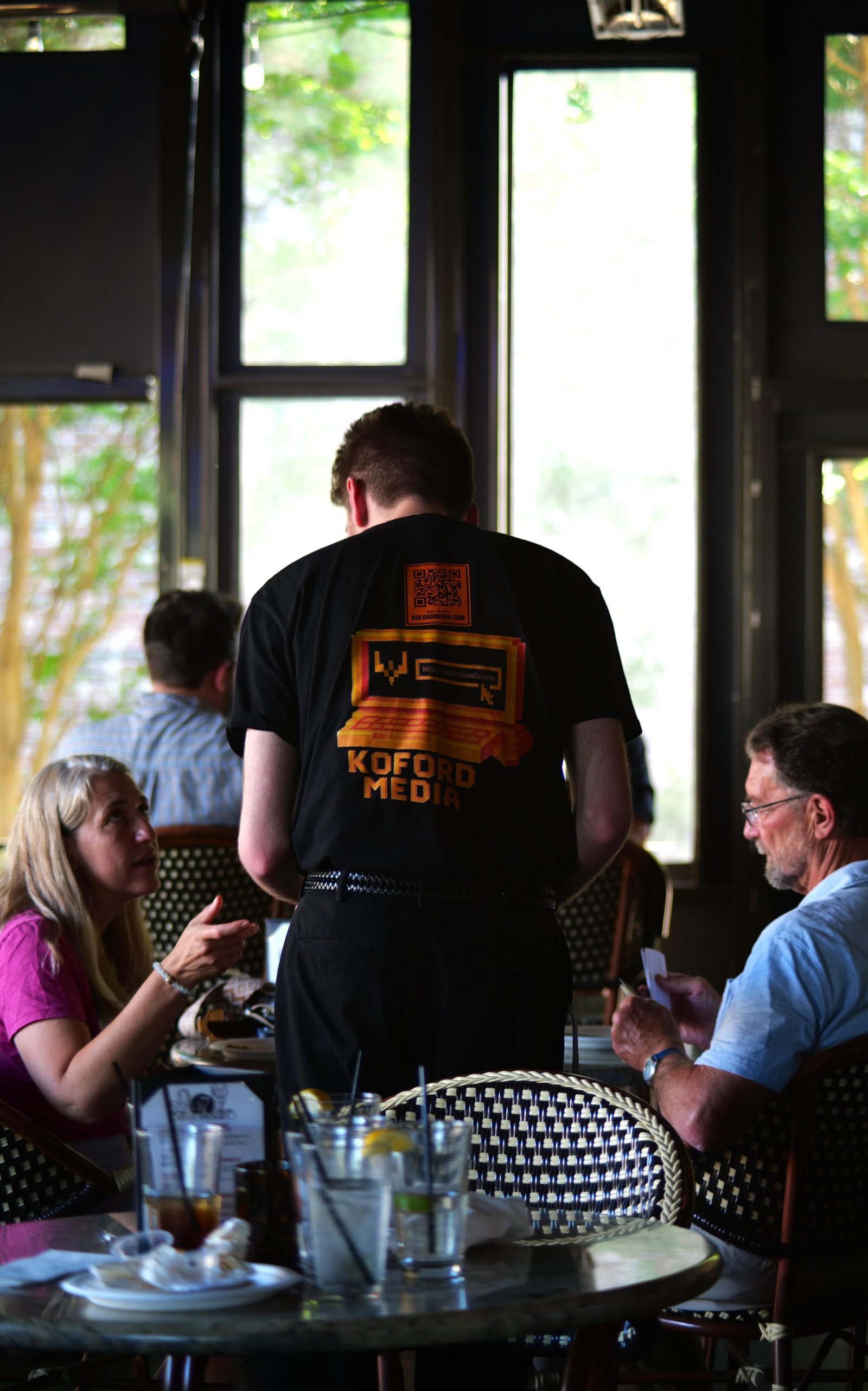 Koford Media branded shirt at a Charlotte business event