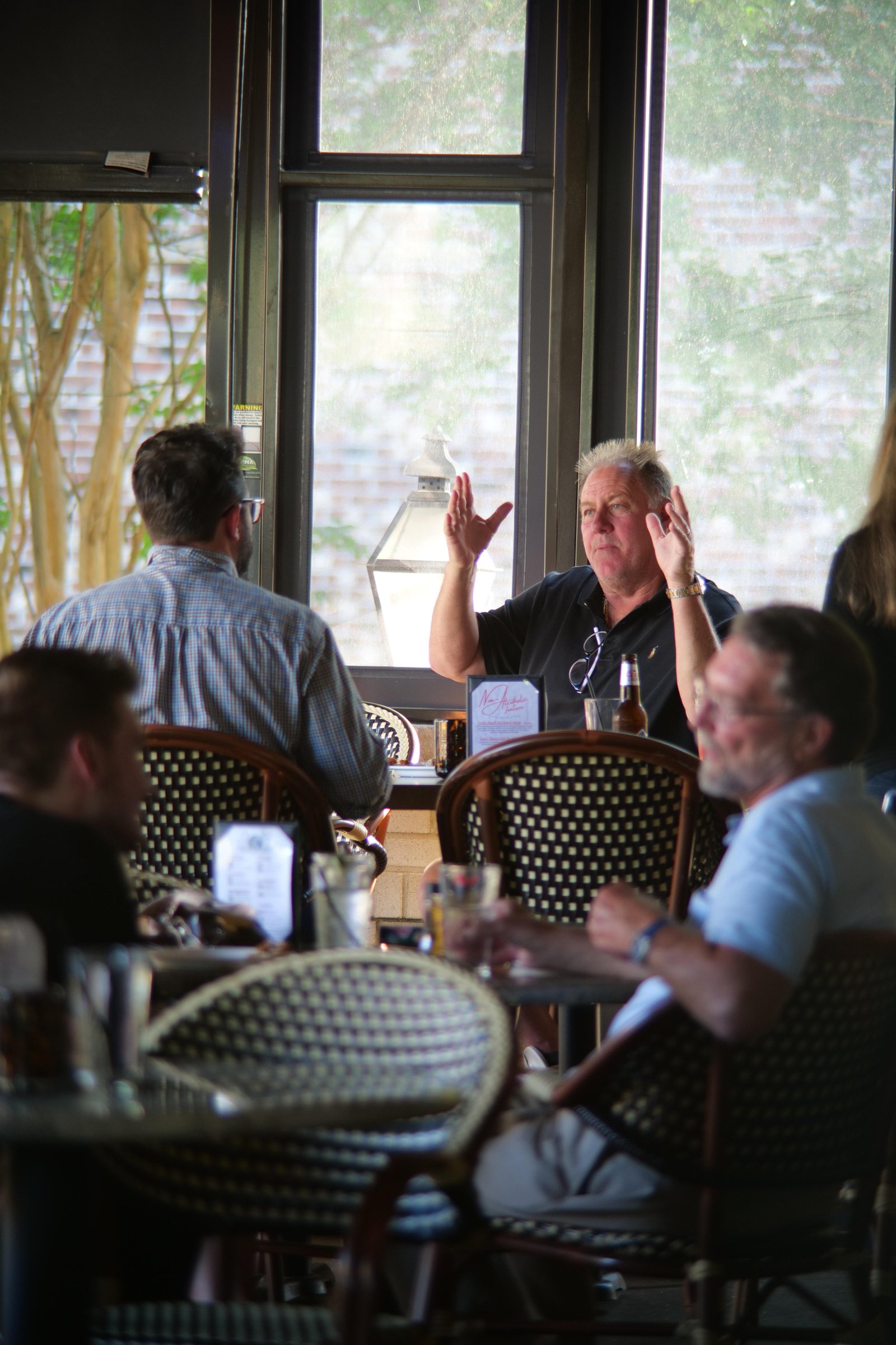 Koford Media event photography capturing a Triad business networking conversation