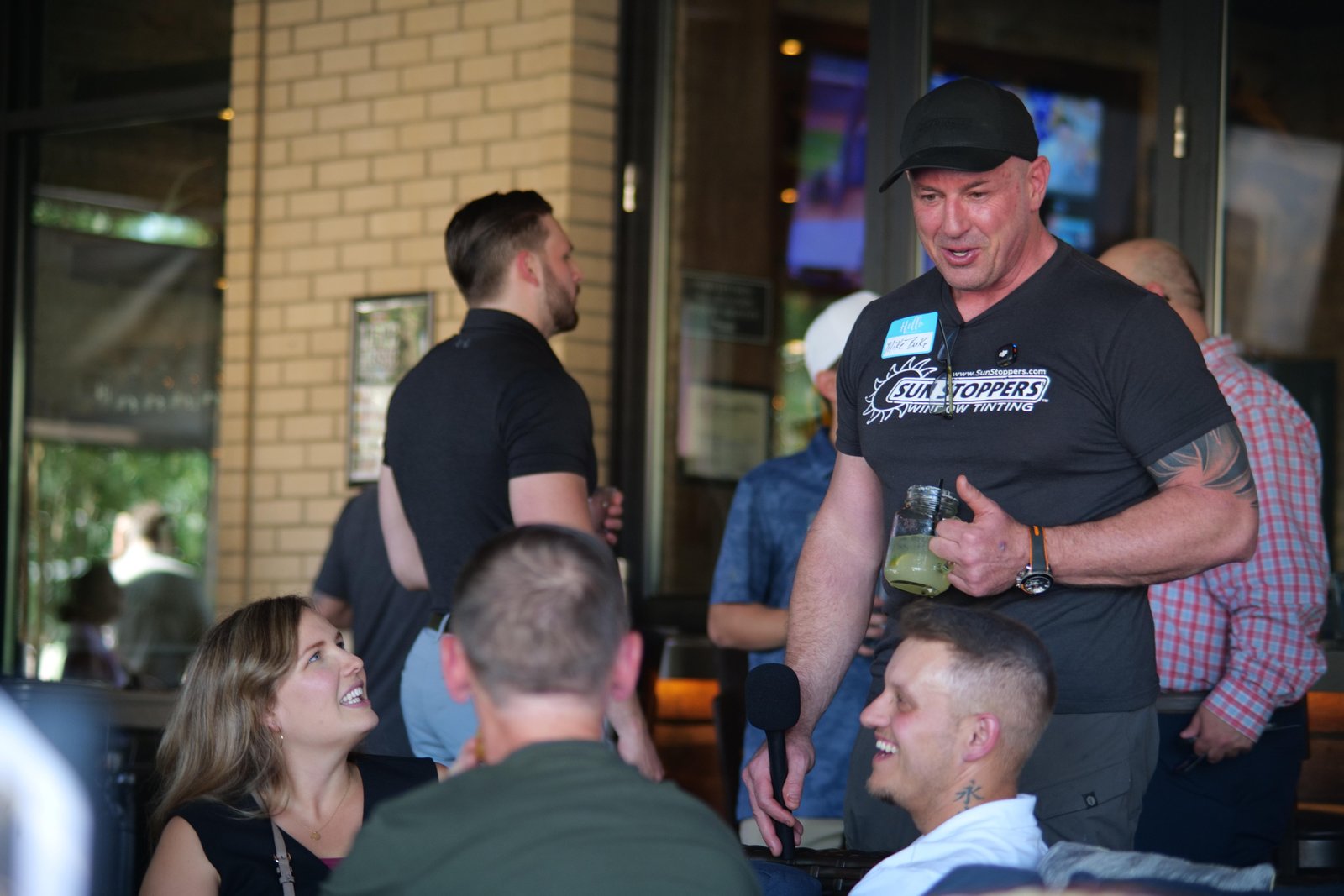 Mike Burke engaging guests at a networking event
